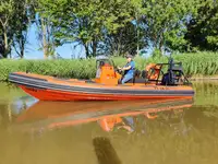 Rigid inflatable boat for sale